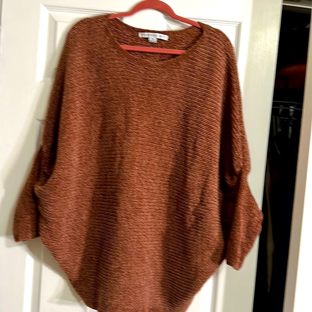 This super soft piece is a burnt auburn color size M